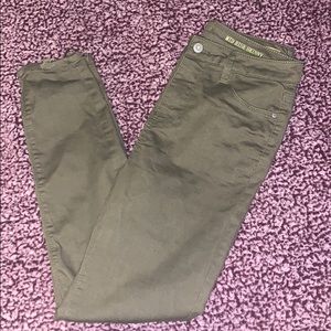 True Craft olive green distressed jean/jegging.